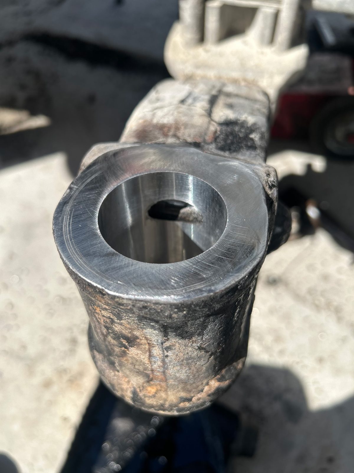 Steering axle eye after repair, bored and sleeved to restore the correct fit